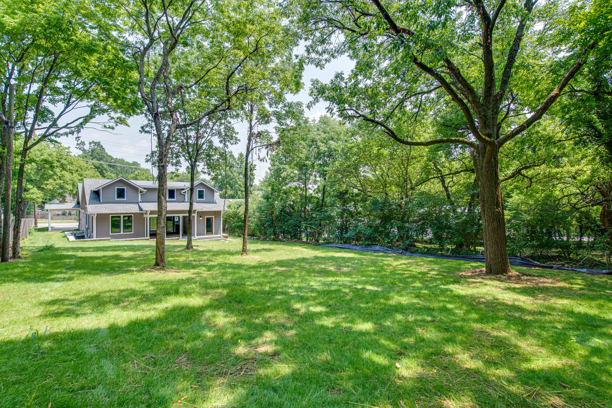 2111 Natchez Trace Nashville, TN 37212 - Photo 35 of 41 a house with a big yard and large trees