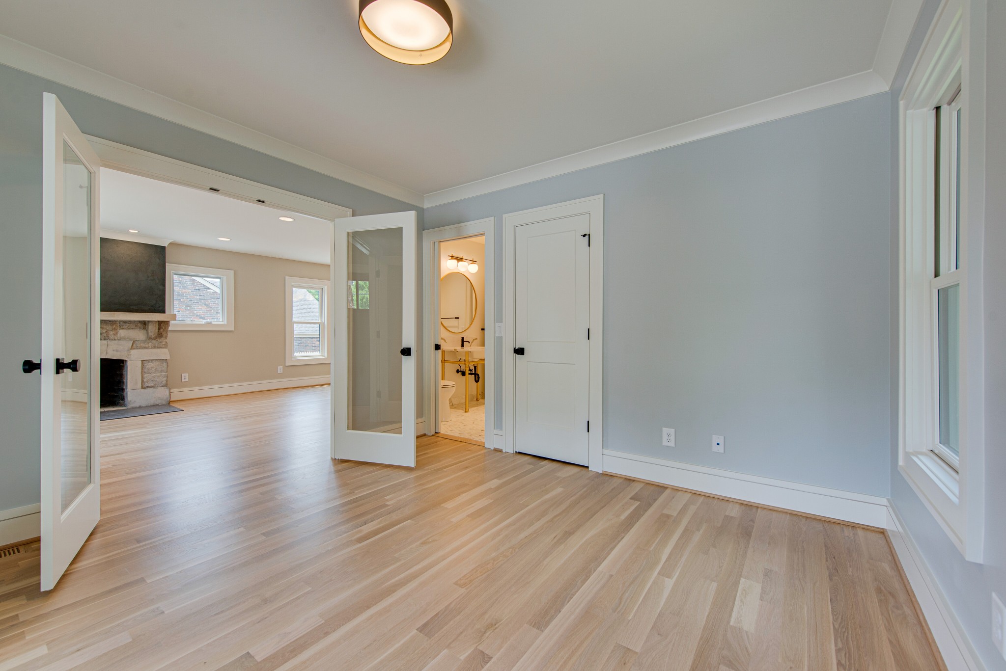 2111 Natchez Trace Nashville, TN 37212 - Photo 7 of 41 a view of a livingroom with wooden floor