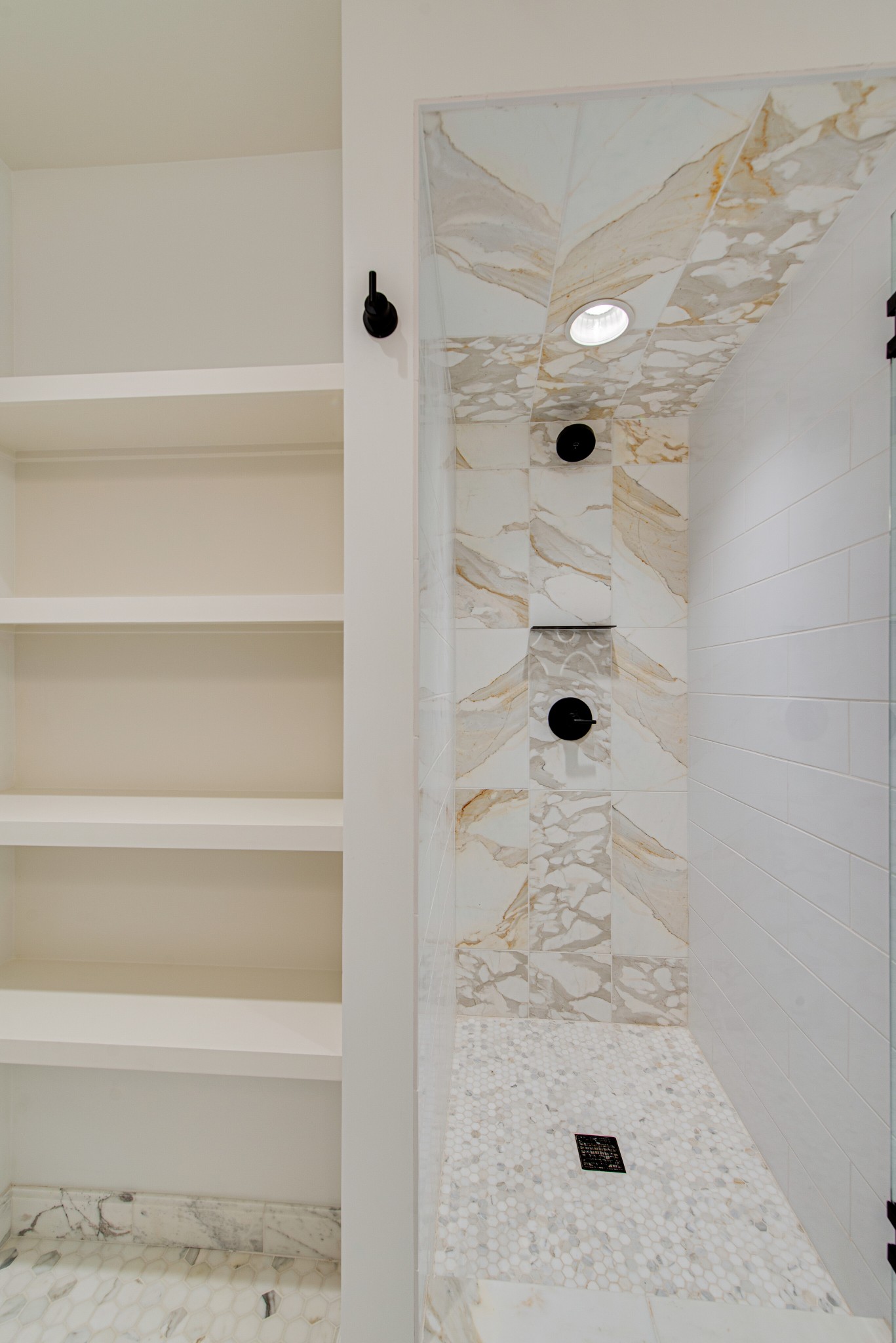 2111 Natchez Trace Nashville, TN 37212 - Photo 8 of 41 a bathroom with a glass shower door