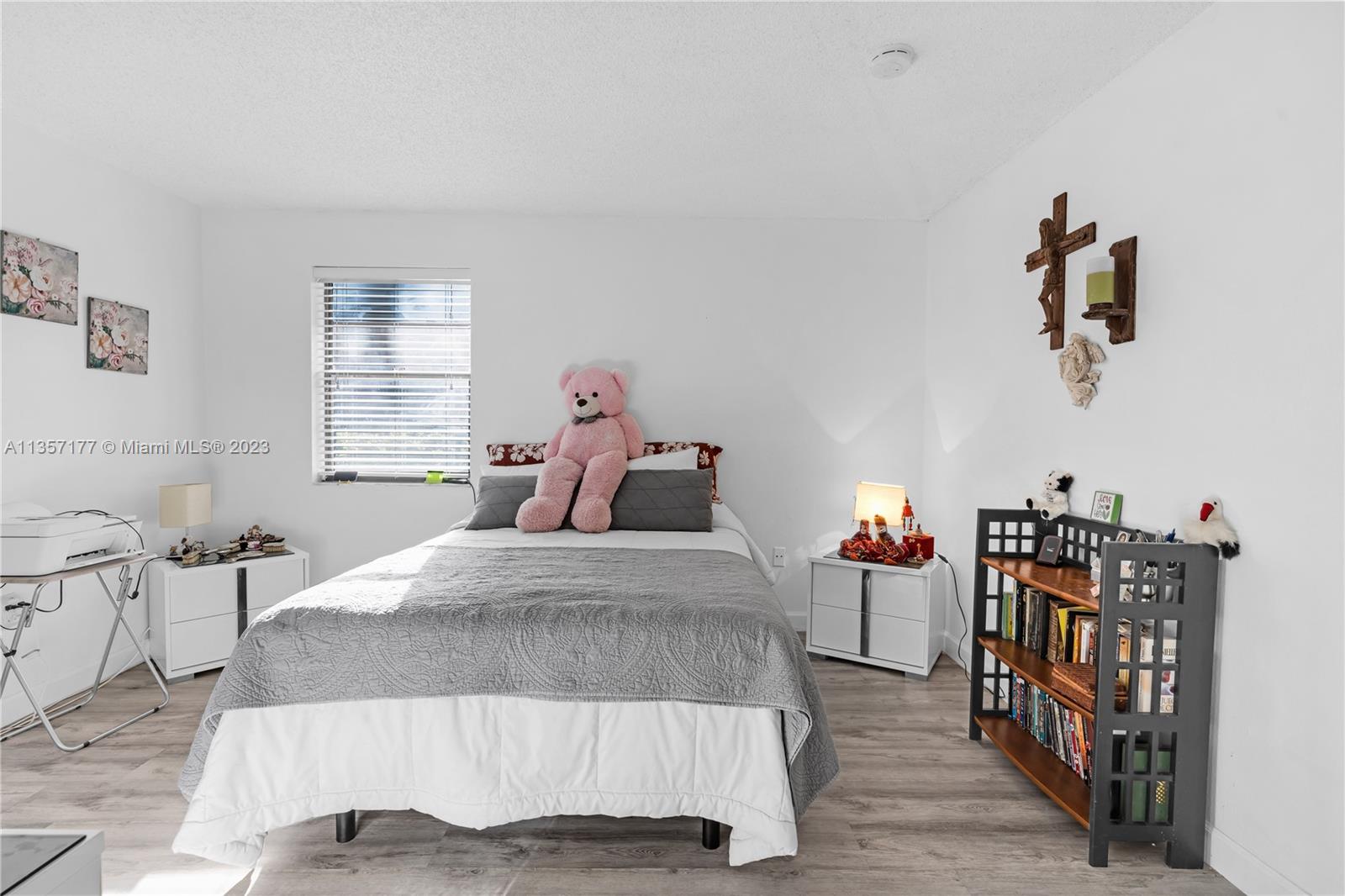 Kendall Miami, FL 33176 - Photo 13 of 35 a bedroom with a bed and wooden floor