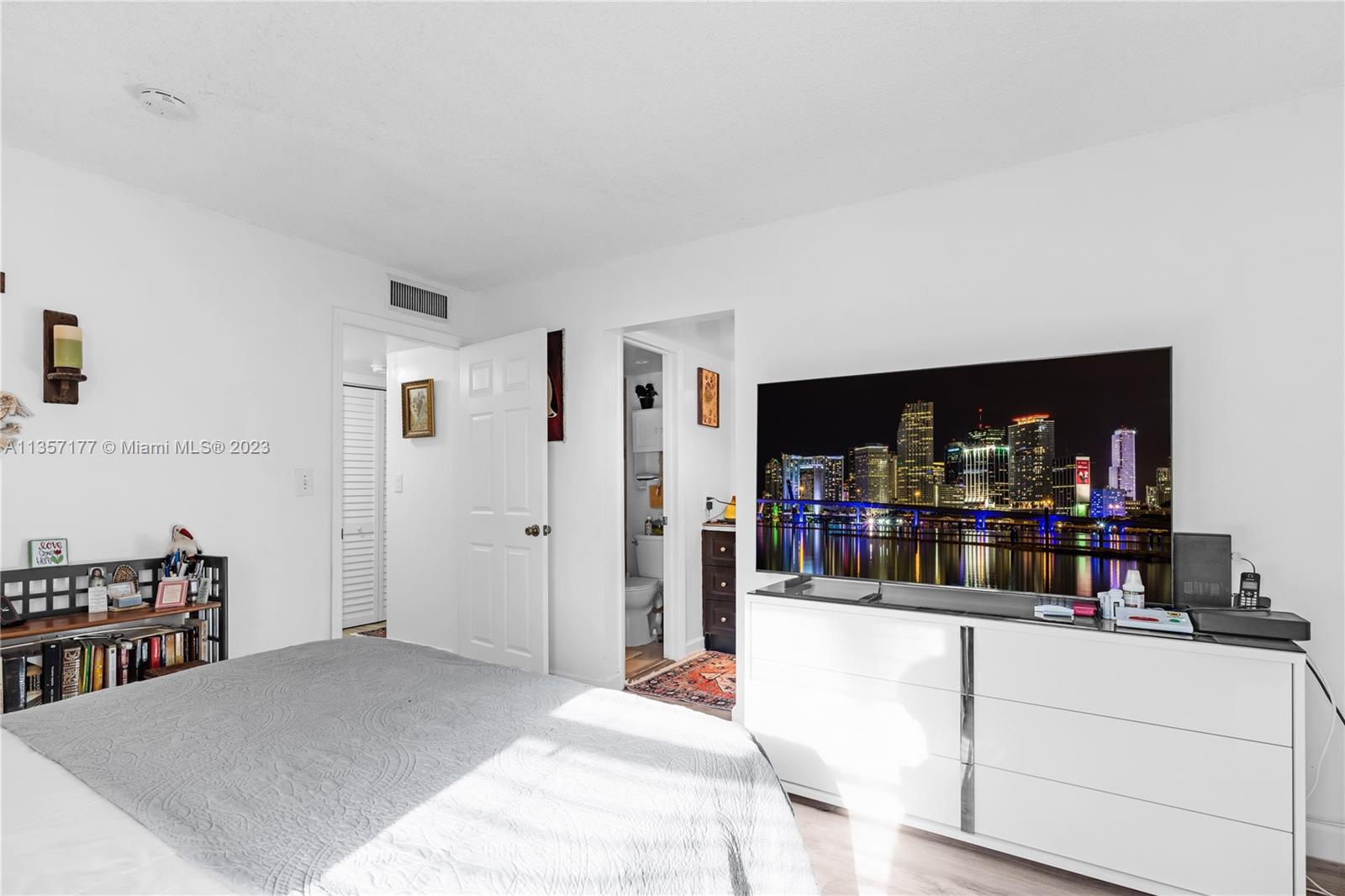 Kendall Miami, FL 33176 - Photo 14 of 35 a bedroom with a bed and a dresser