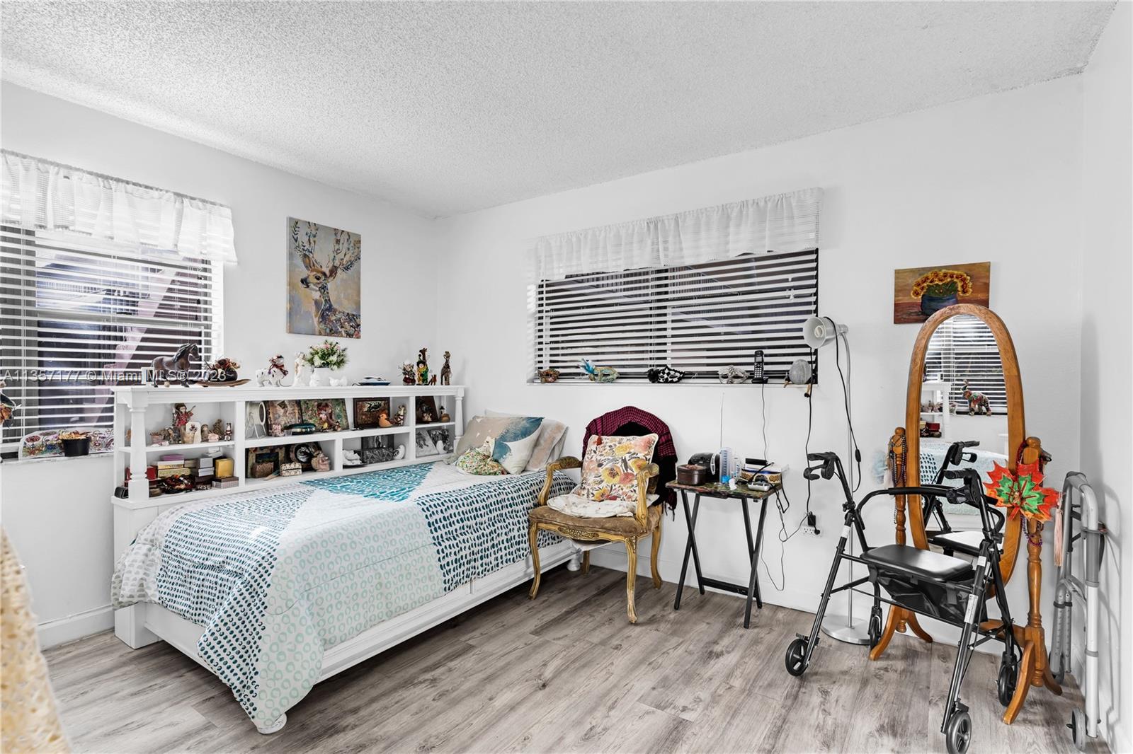 Kendall Miami, FL 33176 - Photo 18 of 35 a living room with furniture and a wooden floor