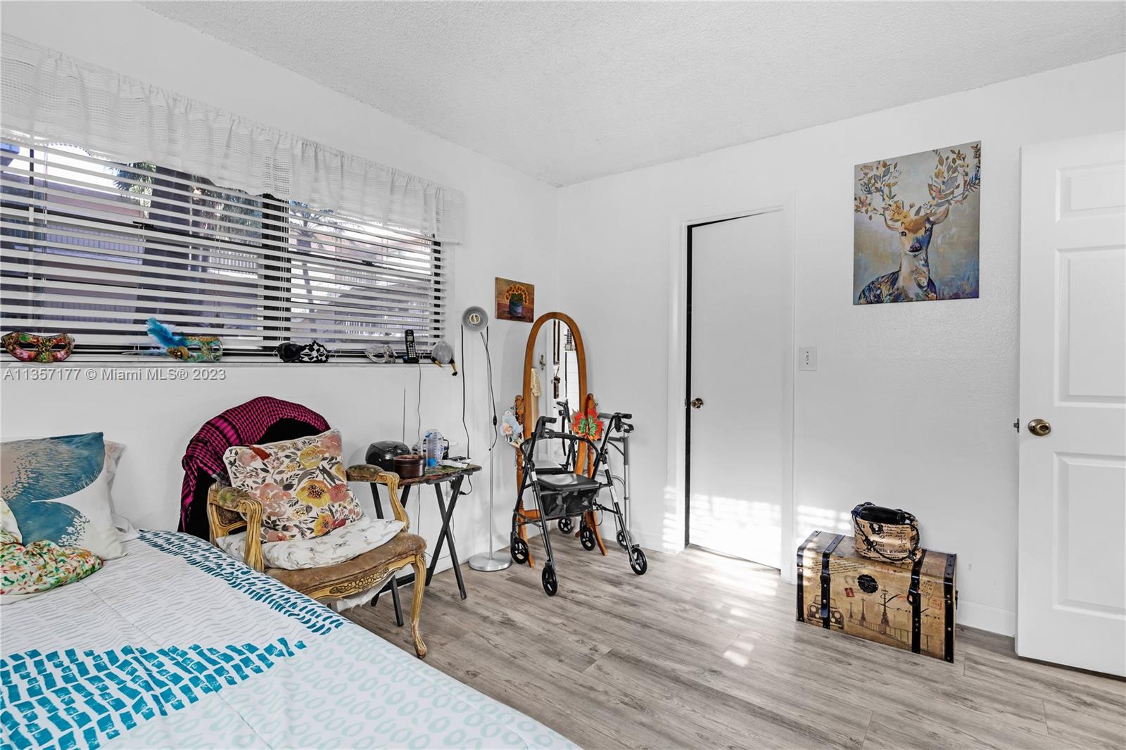 Kendall Miami, FL 33176 - Photo 19 of 35 a view of a workspace with furniture and wooden floor