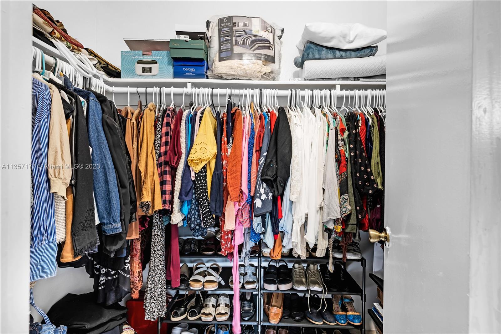 Kendall Miami, FL 33176 - Photo 20 of 35 a view of walk in closet with clothes and shoes