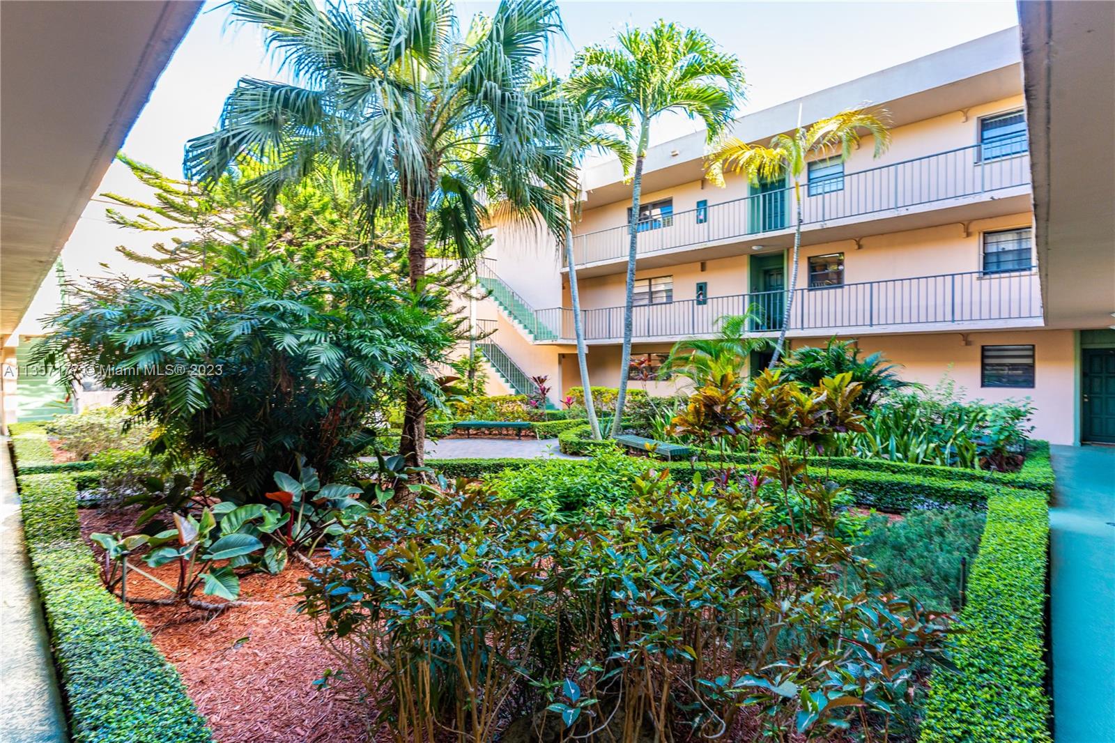 Kendall Miami, FL 33176 - Photo 2 of 35 a front view of a multi story residential apartment building with yard and seating area