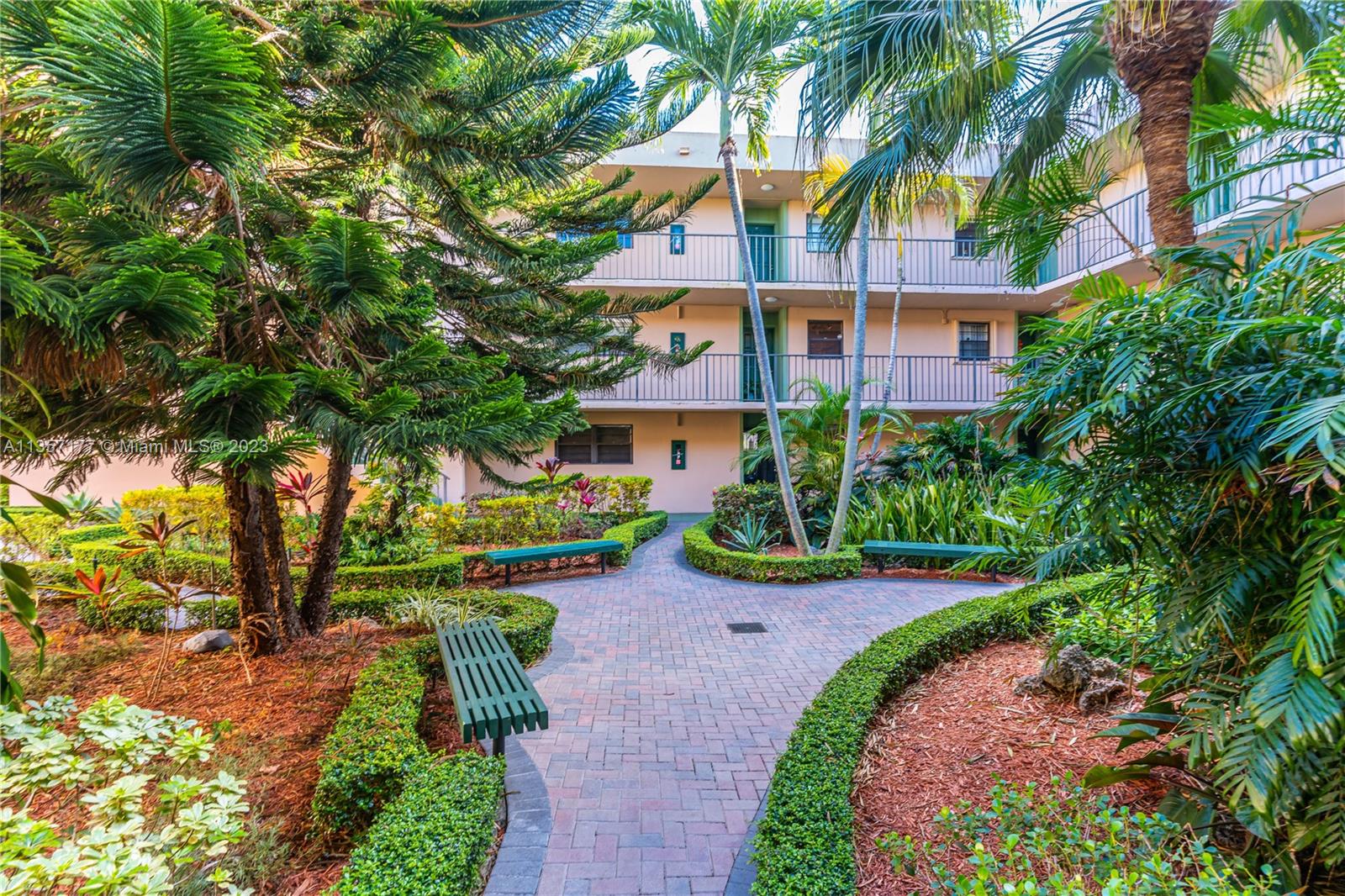 Kendall Miami, FL 33176 - Photo 34 of 35 a front view of a house with a yard and potted plants