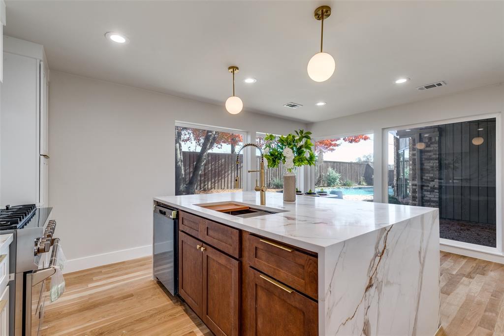 17119 Skelton Place Dallas, TX 75248 - Photo 15 of 32 a kitchen with a sink and counter space