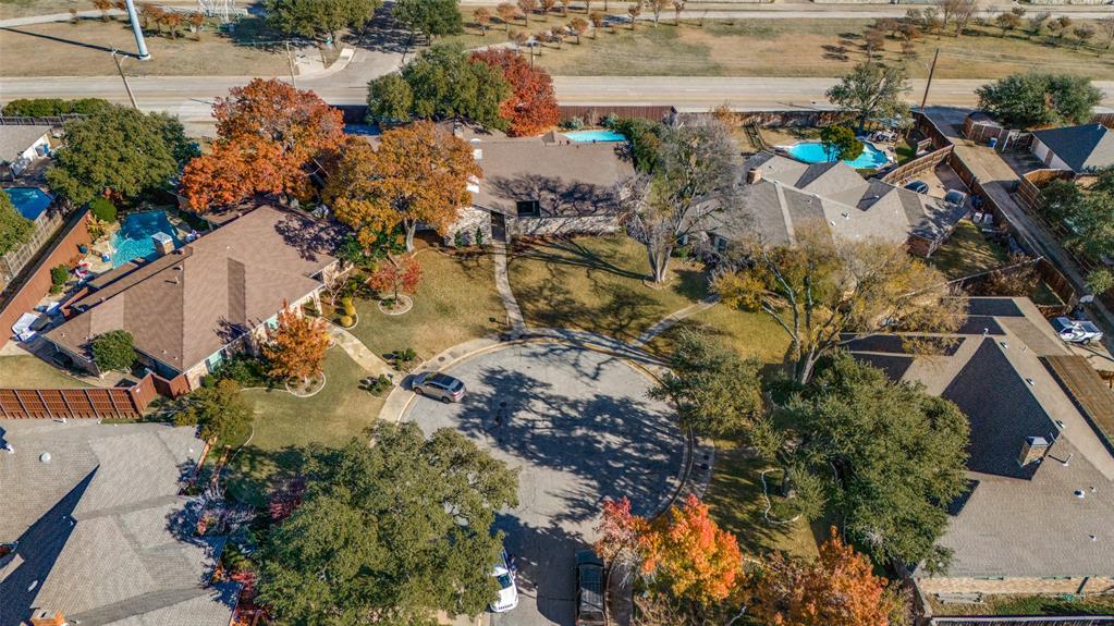 17119 Skelton Place Dallas, TX 75248 - Photo 31 of 32 an aerial view of residential houses with outdoor space