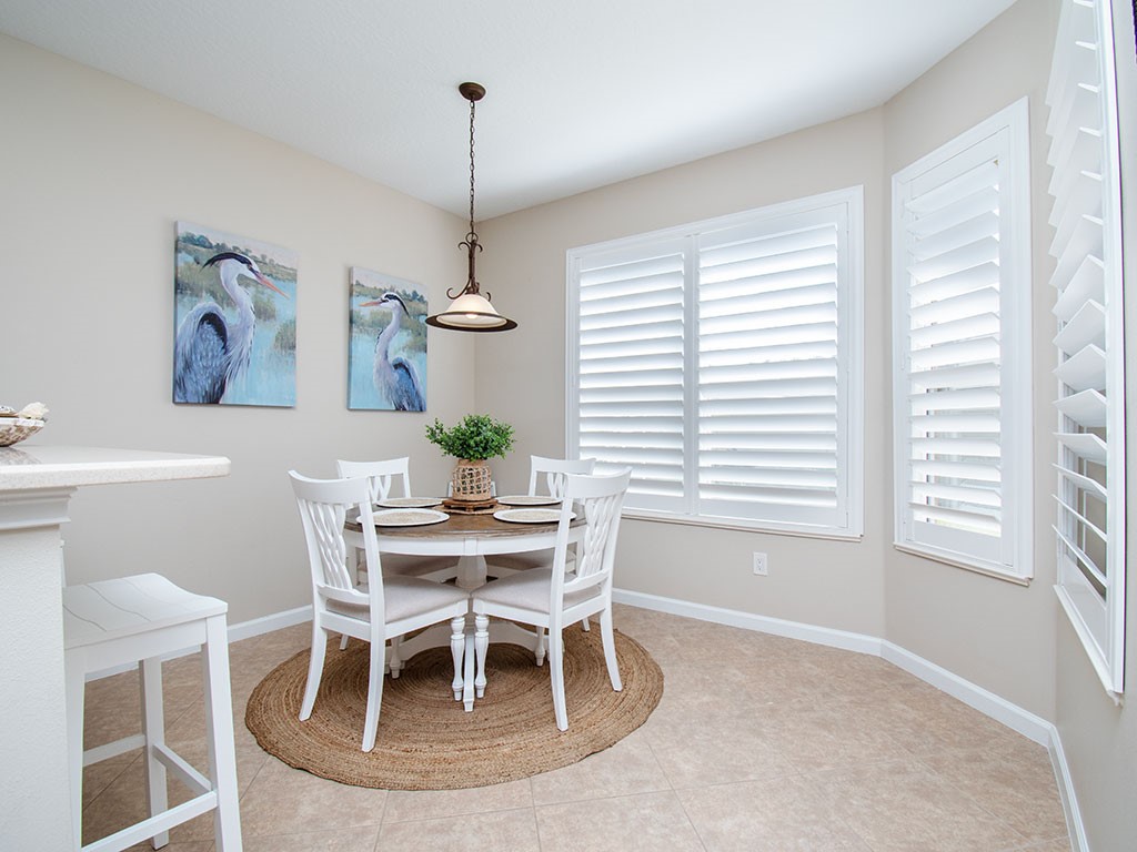 119 Amherst Lane Sebastian, FL 32958 - Photo 17 of 35 a view of a dining room with furniture window and outside view