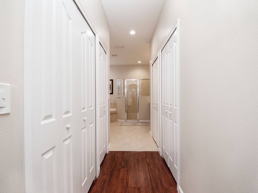 119 Amherst Lane Sebastian, FL 32958 - Photo 21 of 35 a view of a hallway with wooden floor