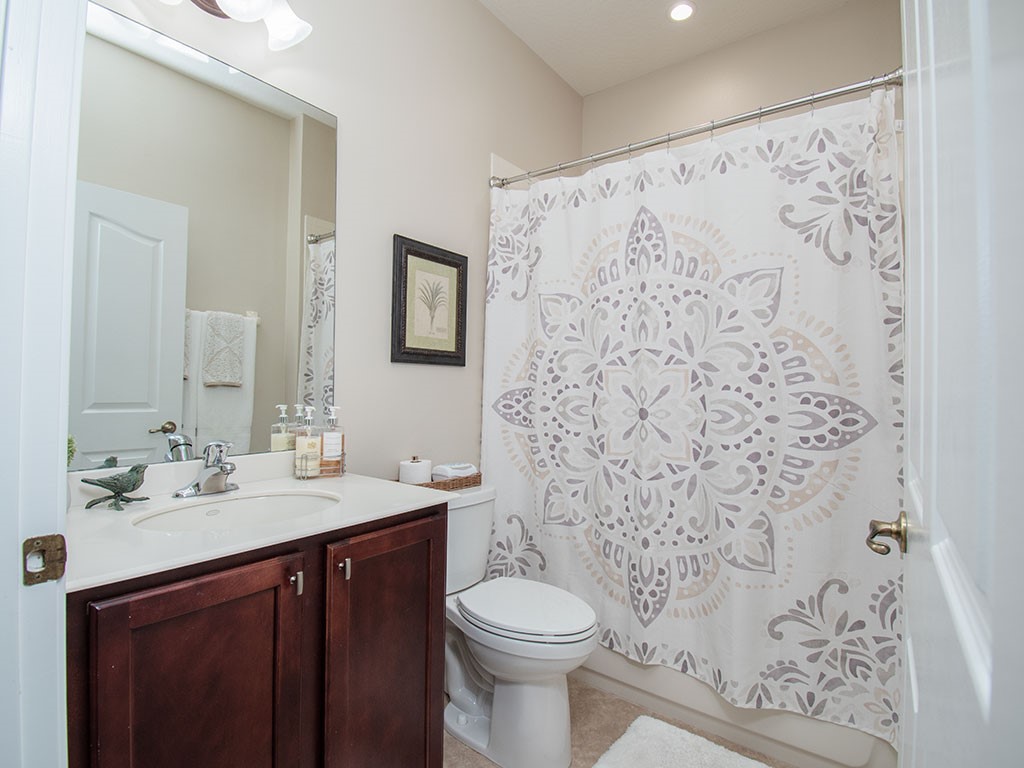 119 Amherst Lane Sebastian, FL 32958 - Photo 26 of 35 a bathroom with a sink and a mirror