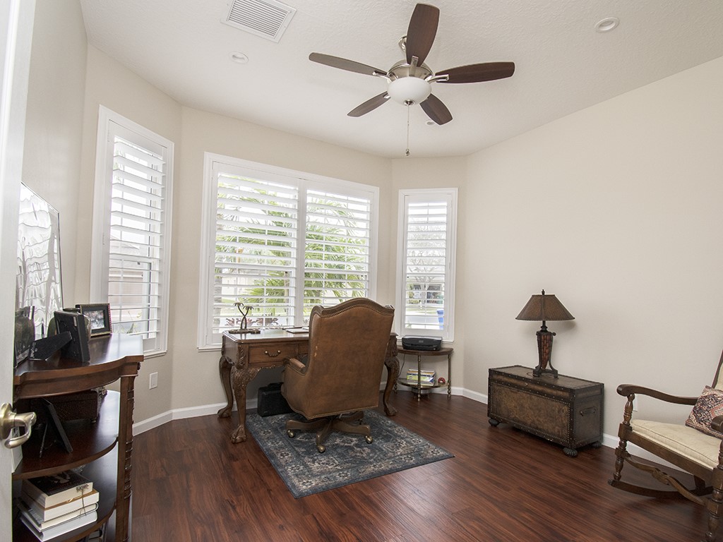 119 Amherst Lane Sebastian, FL 32958 - Photo 27 of 35 a living room with furniture and a window