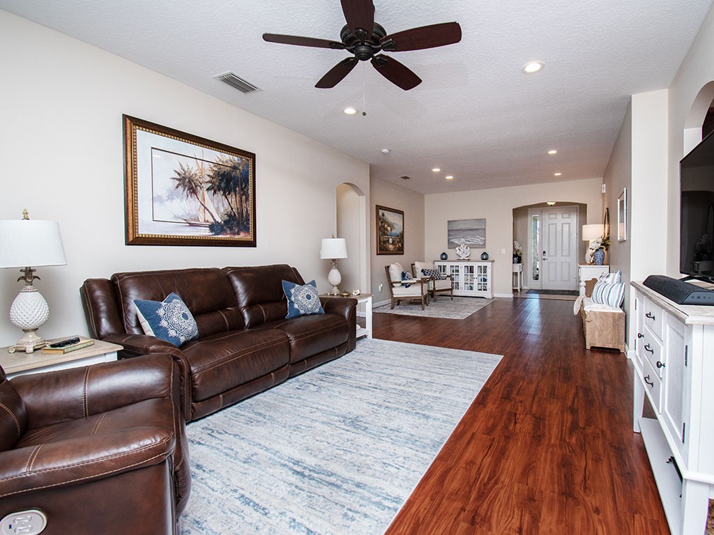 119 Amherst Lane Sebastian, FL 32958 - Photo 5 of 35 a living room with furniture and a wooden floor