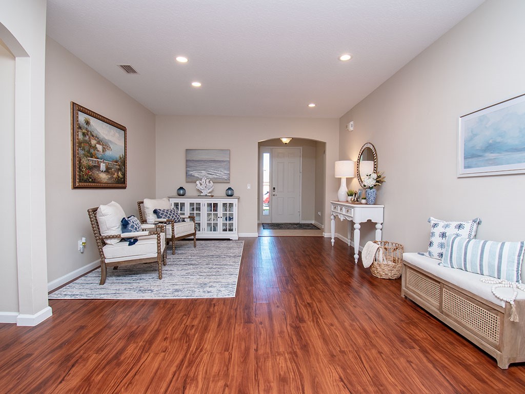 119 Amherst Lane Sebastian, FL 32958 - Photo 8 of 35 a living room with furniture and a wooden floor