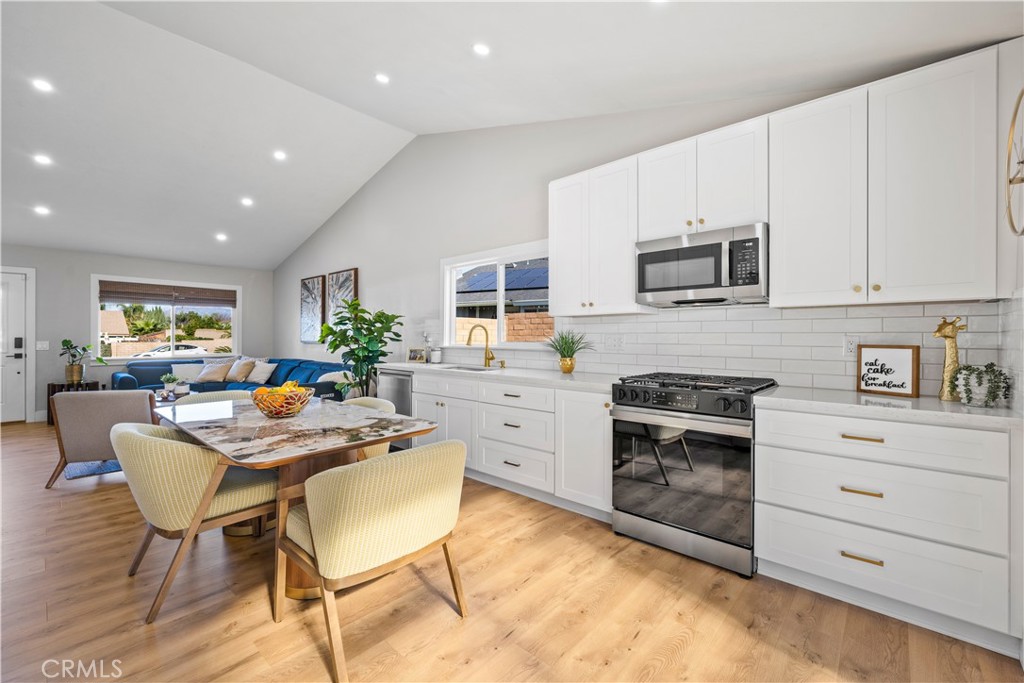 10620 Gemini Drive Riverside, CA 92503 - Photo 6 of 44 White cabinetry with gold-toned hardware.