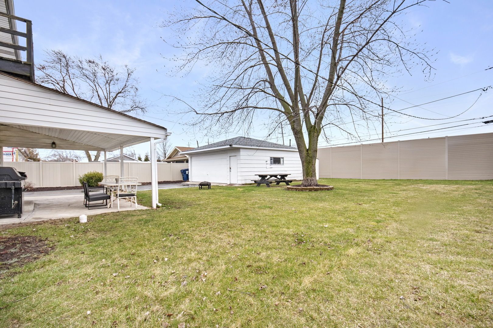 7506 Ferdinand Avenue Bridgeview, IL 60455 - Photo 3 of 14 a view of a house with a yard