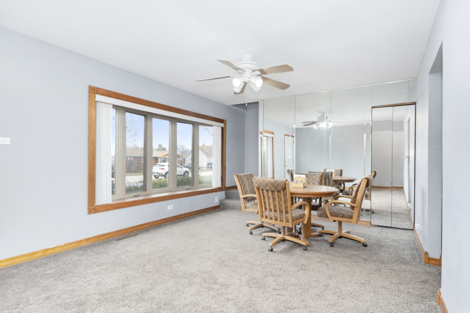 7506 Ferdinand Avenue Bridgeview, IL 60455 - Photo 5 of 14 a dining room with furniture and a large window