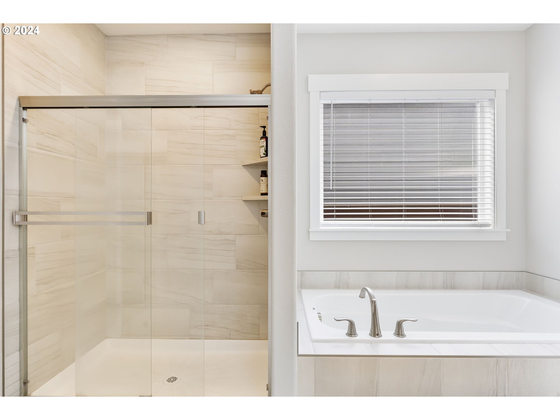 1838 South 46th Place Ridgefield, WA 98642 - Photo 23 of 47 a bathroom with a bathtub and a shower