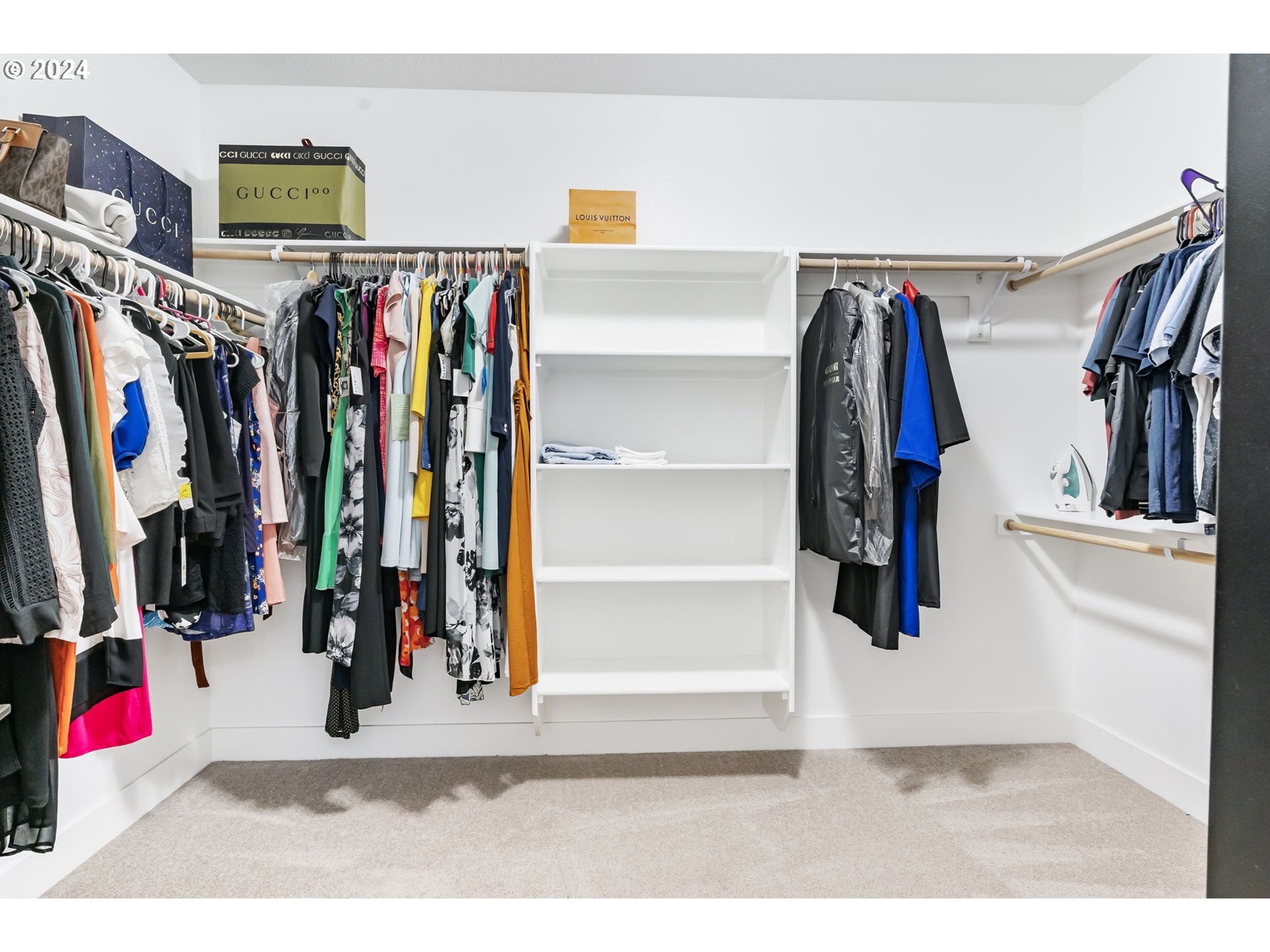 1838 South 46th Place Ridgefield, WA 98642 - Photo 24 of 47 a view of walk in closet with clothes and shoes