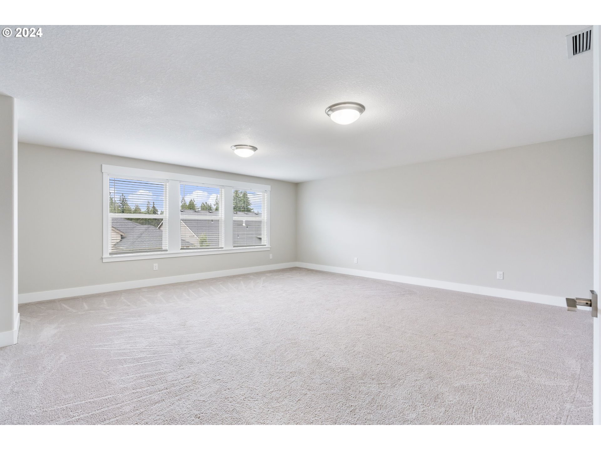 1838 South 46th Place Ridgefield, WA 98642 - Photo 25 of 47 a view of an empty room with a window