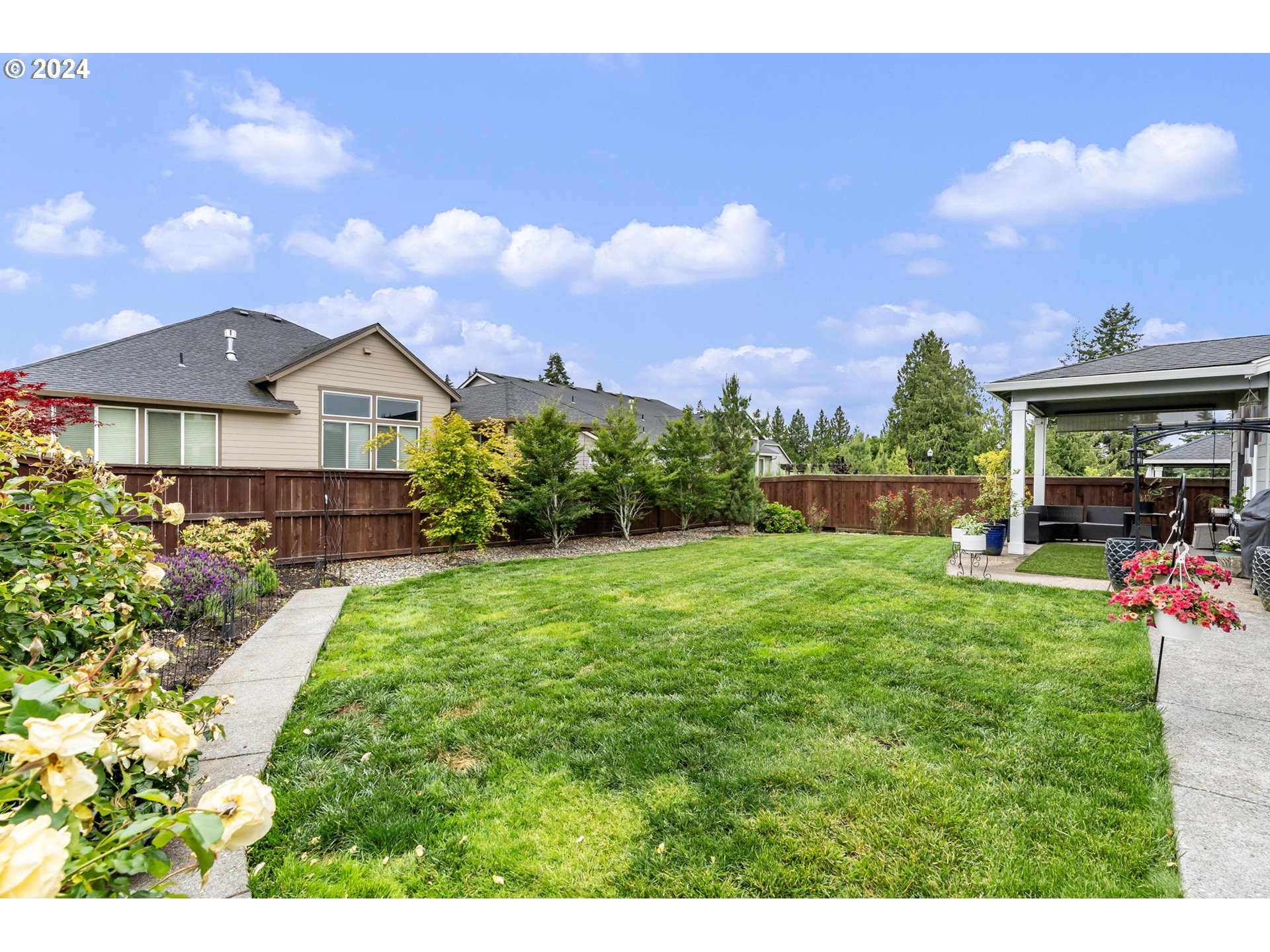 1838 South 46th Place Ridgefield, WA 98642 - Photo 40 of 47 a front view of a house with garden