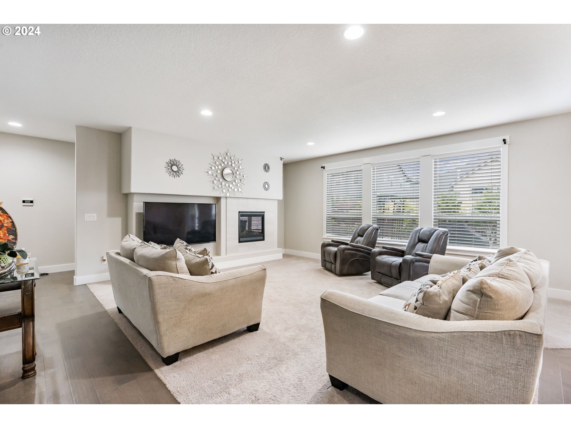1838 South 46th Place Ridgefield, WA 98642 - Photo 7 of 47 a living room with furniture flat screen tv and a large window