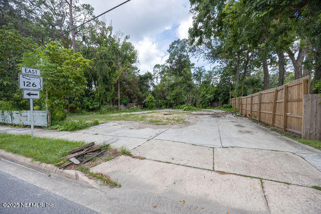 3724 Hendricks Avenue Jacksonville, FL 32207 - Photo 2 of 25 a backyard view of a house with basket ball court