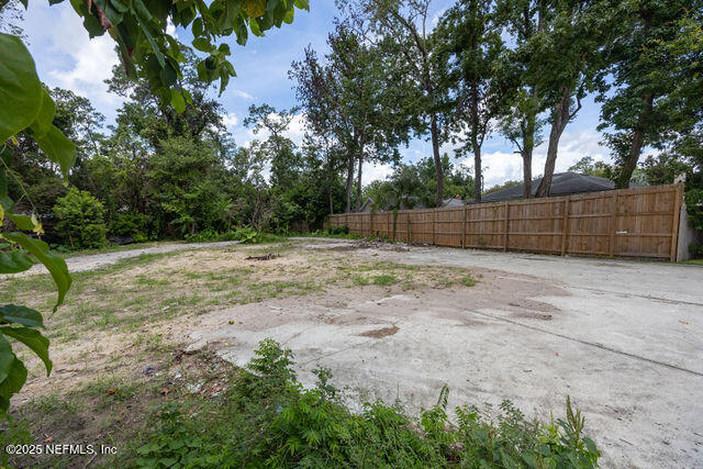 3724 Hendricks Avenue Jacksonville, FL 32207 - Photo 6 of 25 a view of a backyard with trees