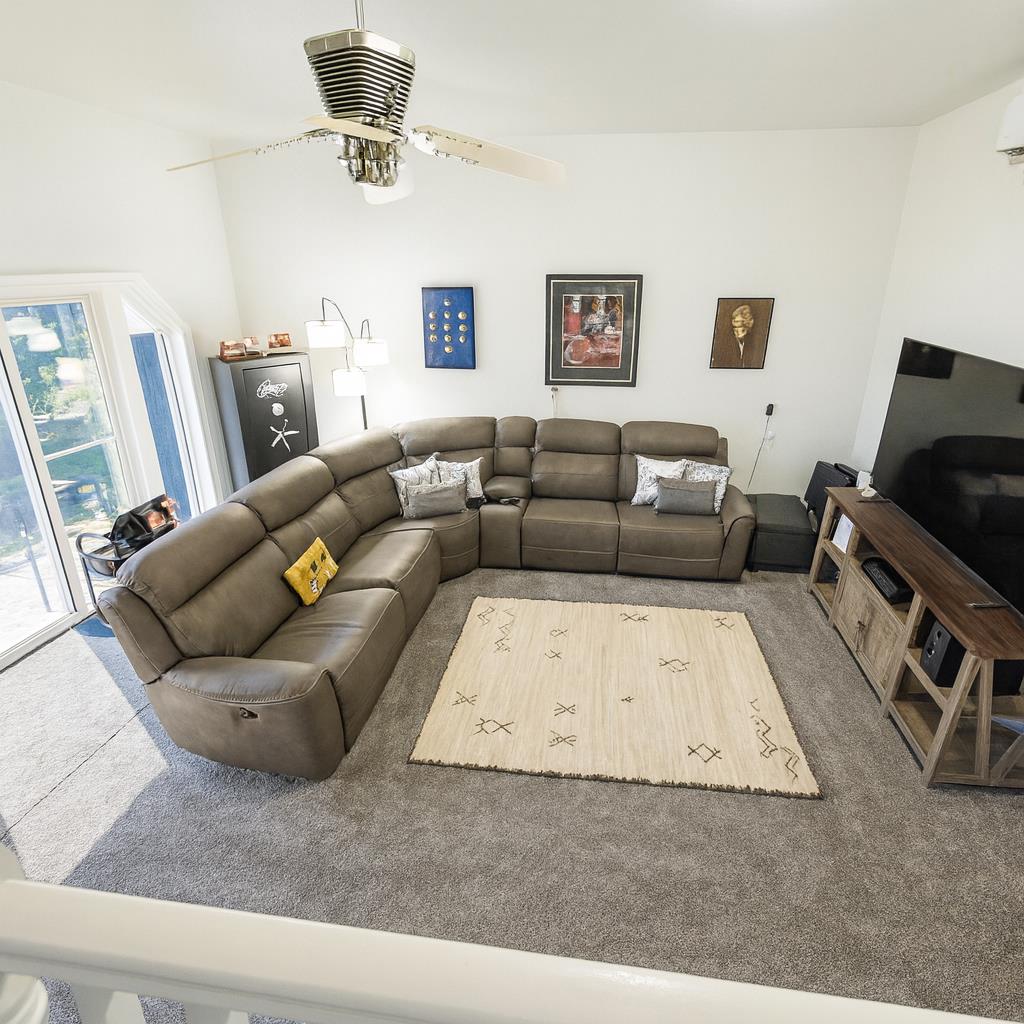 10092 Smith Road Grass Valley, CA 95949 - Photo 29 of 58 a living room with furniture and a couch