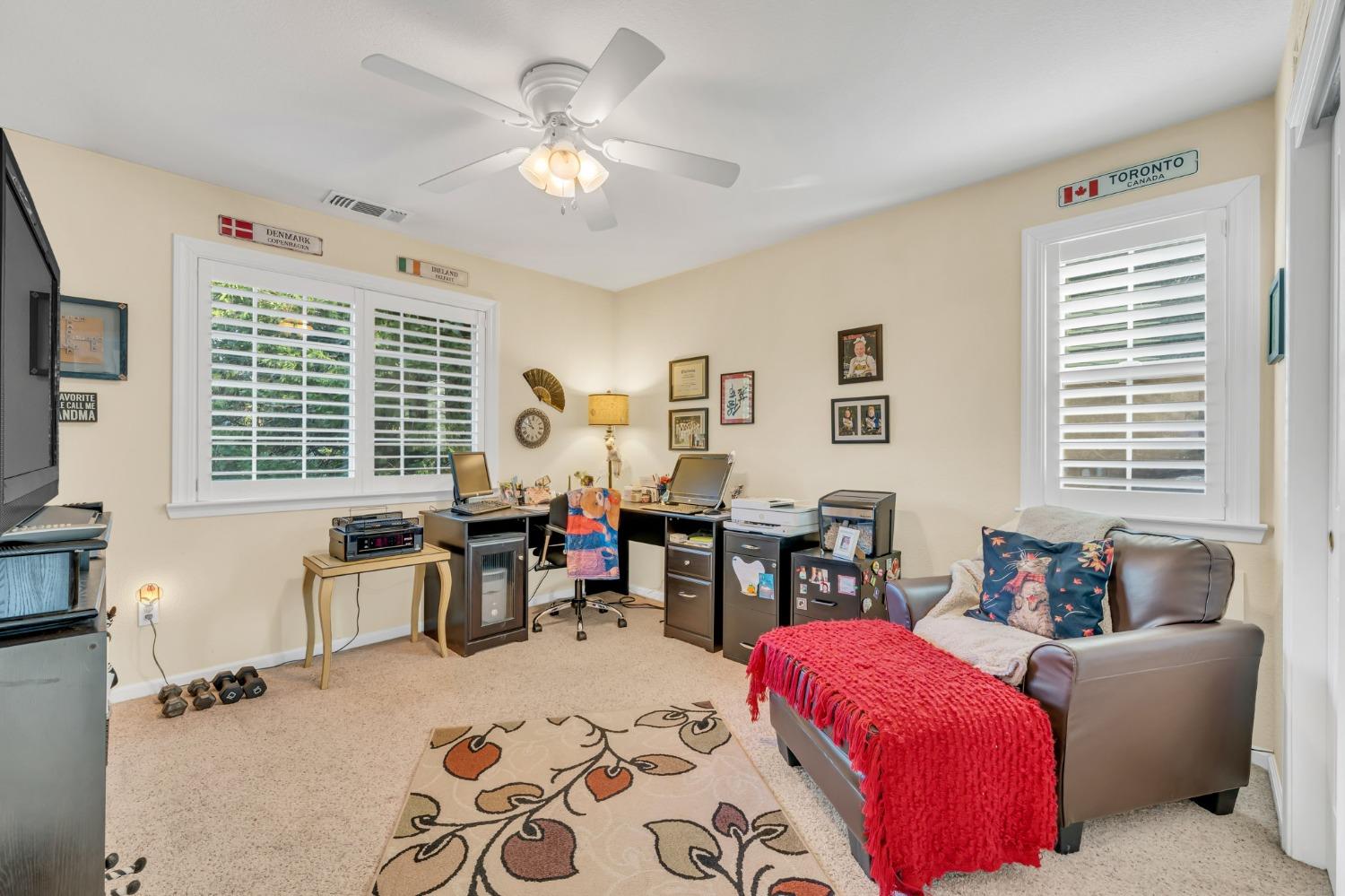 10092 Smith Road Grass Valley, CA 95949 - Photo 38 of 58 a living room with furniture and a large window