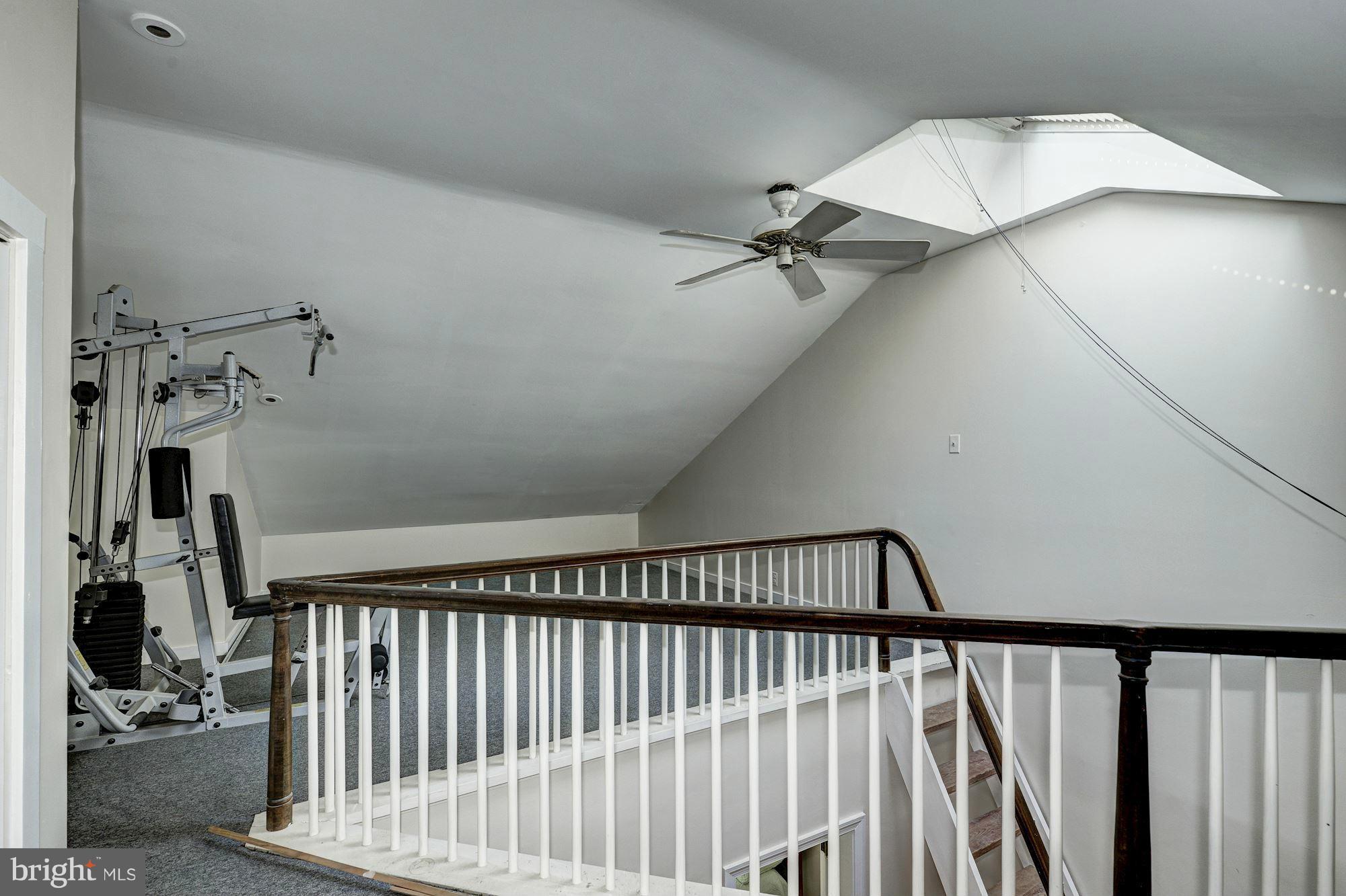 3217 Volta Place Northwest Washington, DC 20007 - Photo 15 of 21 a view of staircase with railing and white walls