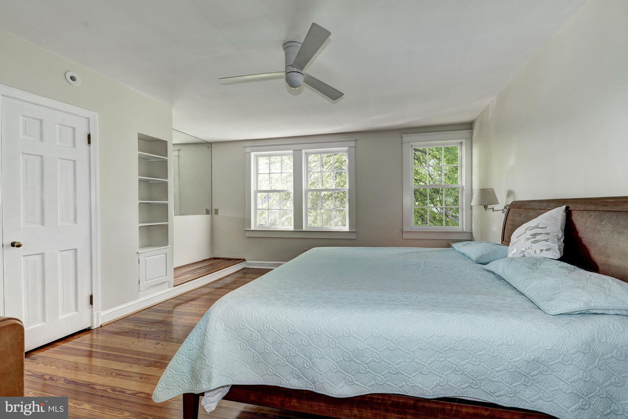 3217 Volta Place Northwest Washington, DC 20007 - Photo 9 of 21 a bedroom with a bed and a window
