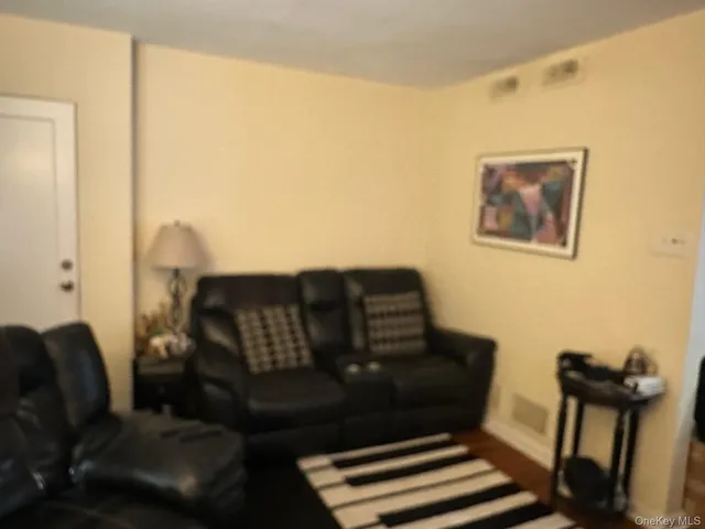 a view of workspace with wooden floor