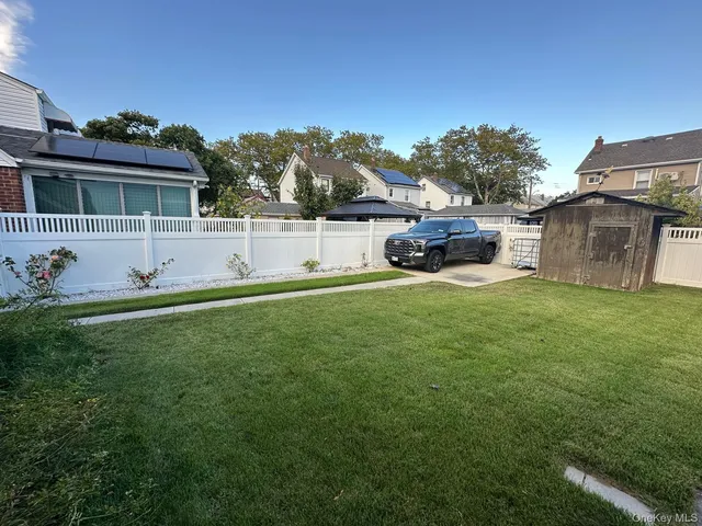 a view of a house with a big yard