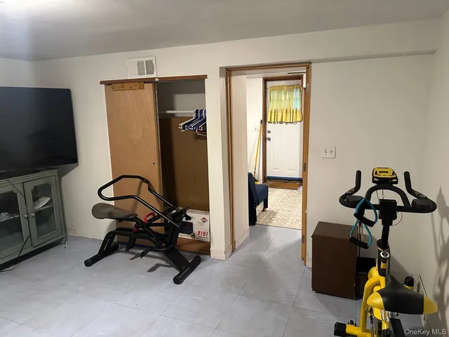 a view of a room with gym equipment