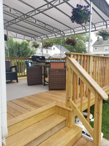 a view of a balcony with chairs
