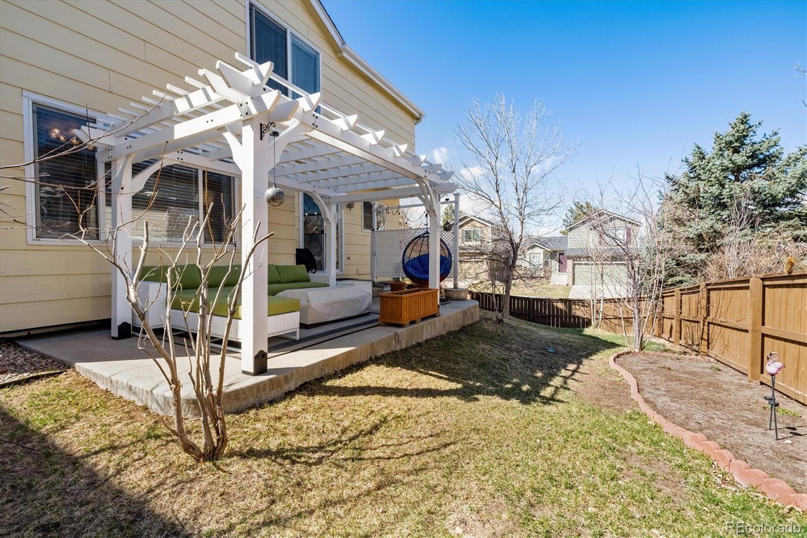 1191 Riddlewood Lane Highlands Ranch, CO 80129 - Photo 26 of 33 a view of a porch