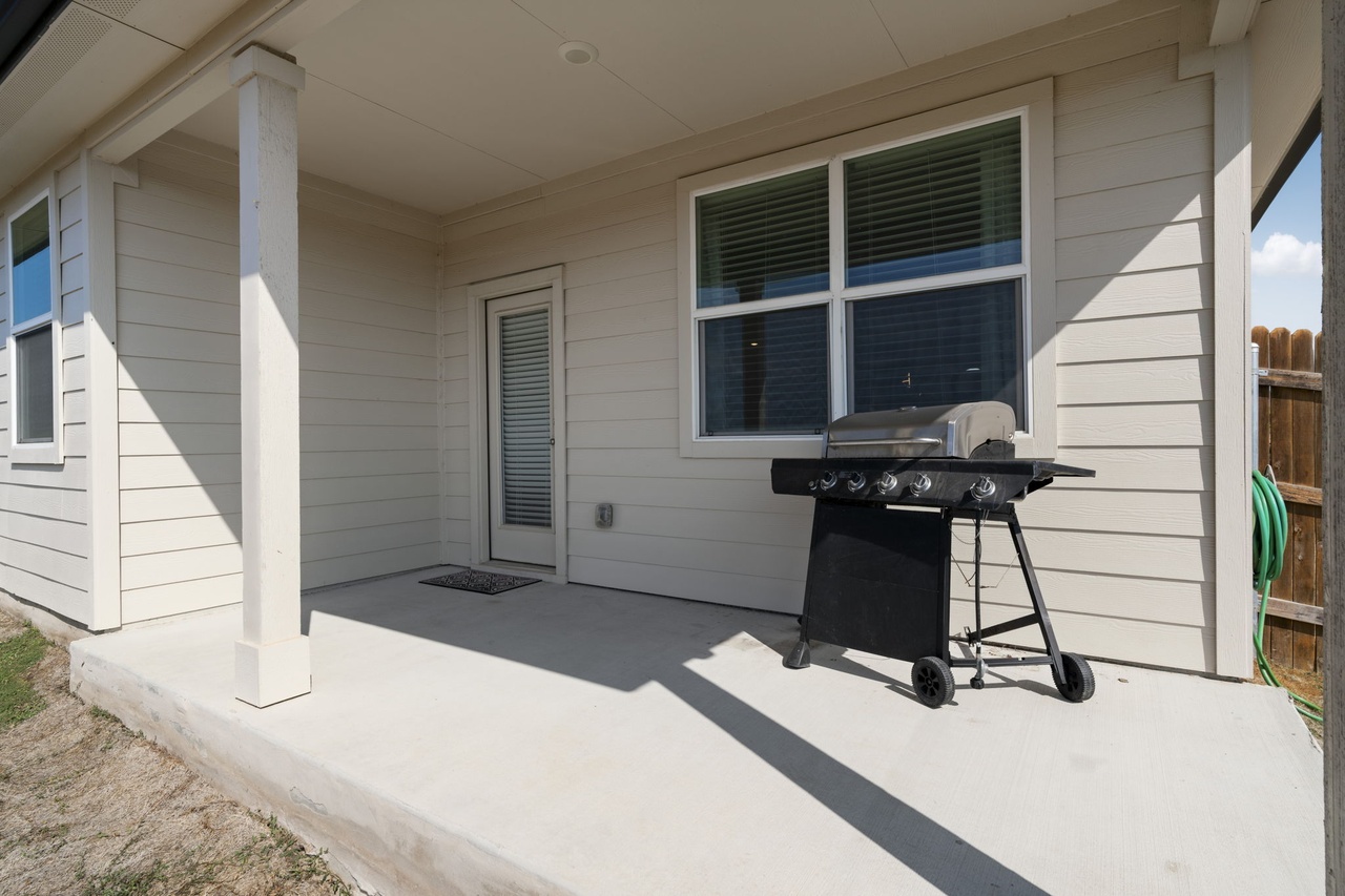 212 Apache Plum Drive Kyle, TX 78640 - Photo 20 of 21 View of patio / terrace with a grill