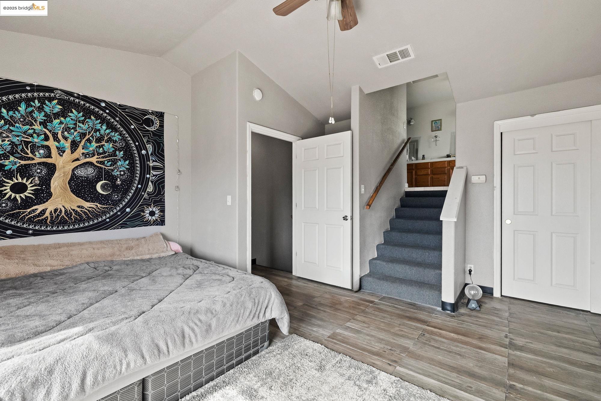 20588 Upper Hillview Drive Sonora, CA 95370 - Photo 13 of 42 a bedroom with a large bed and a window