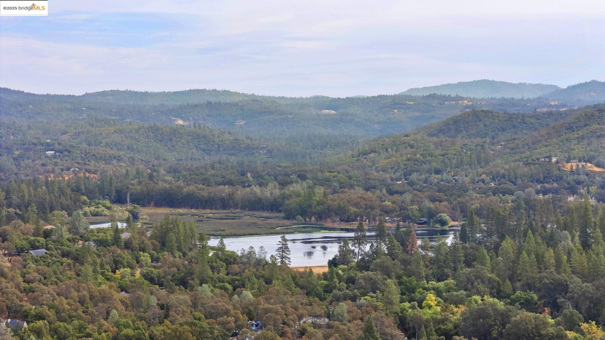 20588 Upper Hillview Drive Sonora, CA 95370 - Photo 2 of 42 an aerial view of houses covered in trees