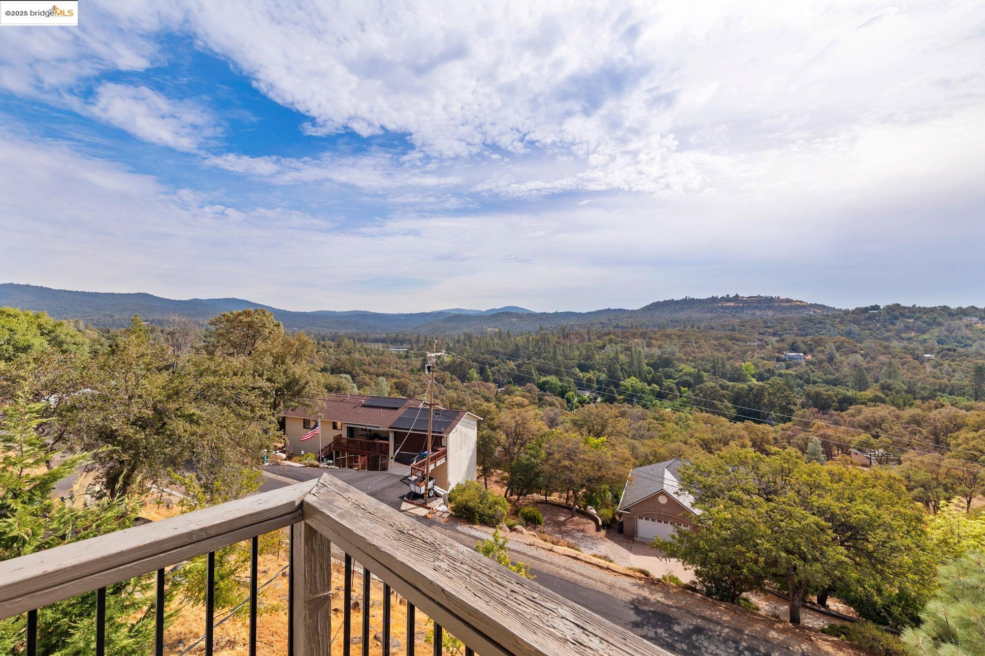 20588 Upper Hillview Drive Sonora, CA 95370 - Photo 22 of 42 a view of a city from a balcony