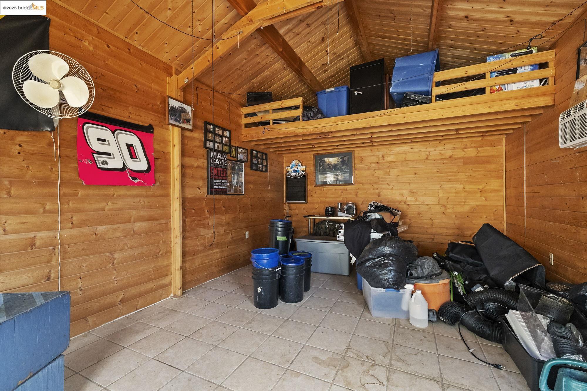 20588 Upper Hillview Drive Sonora, CA 95370 - Photo 30 of 42 a view of a brick building with many windows