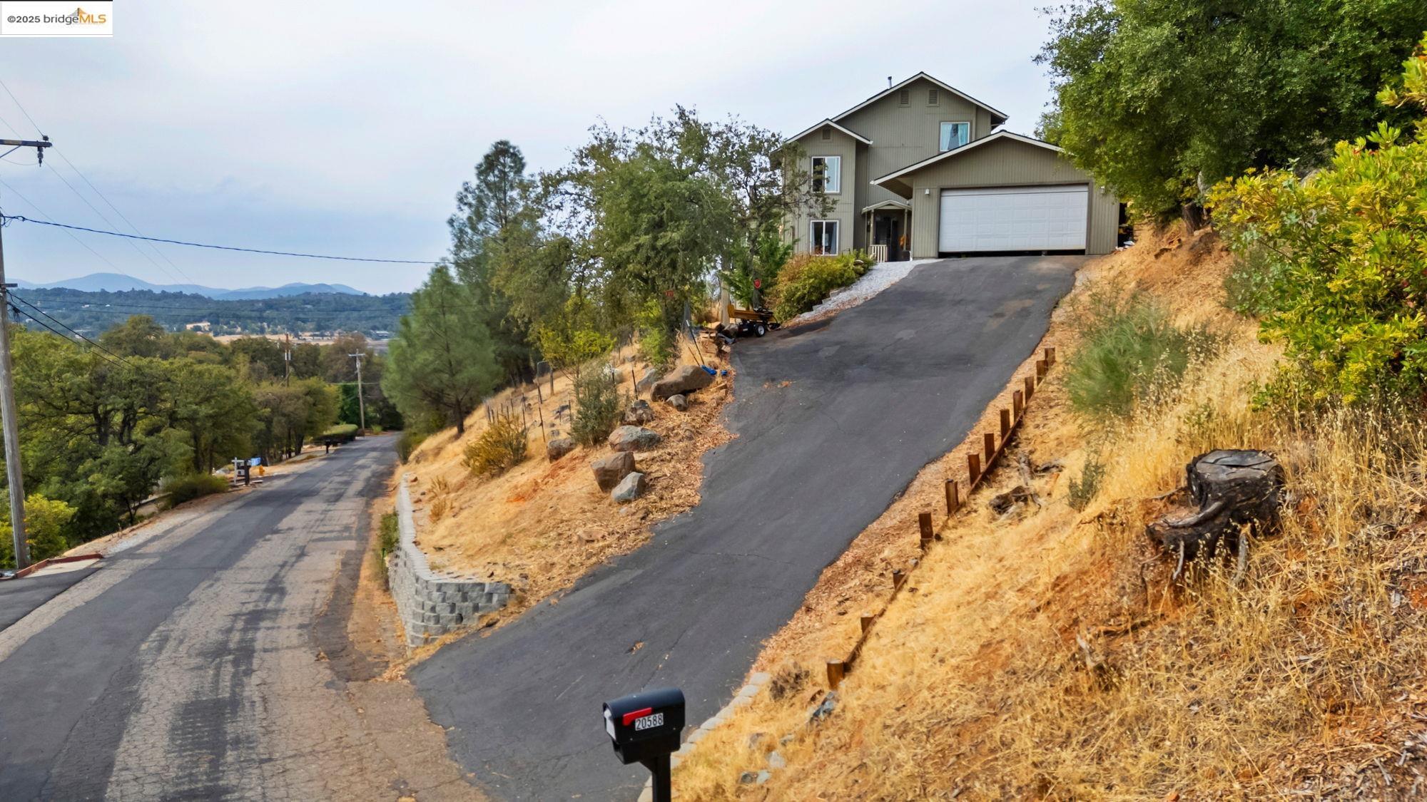20588 Upper Hillview Drive Sonora, CA 95370 - Photo 35 of 42 a view of a house with a yard
