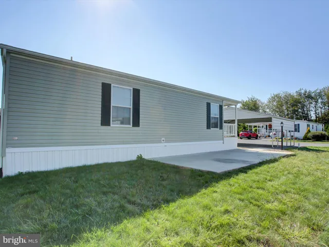 a view of a door and a window