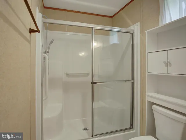 a view of a room with shelves