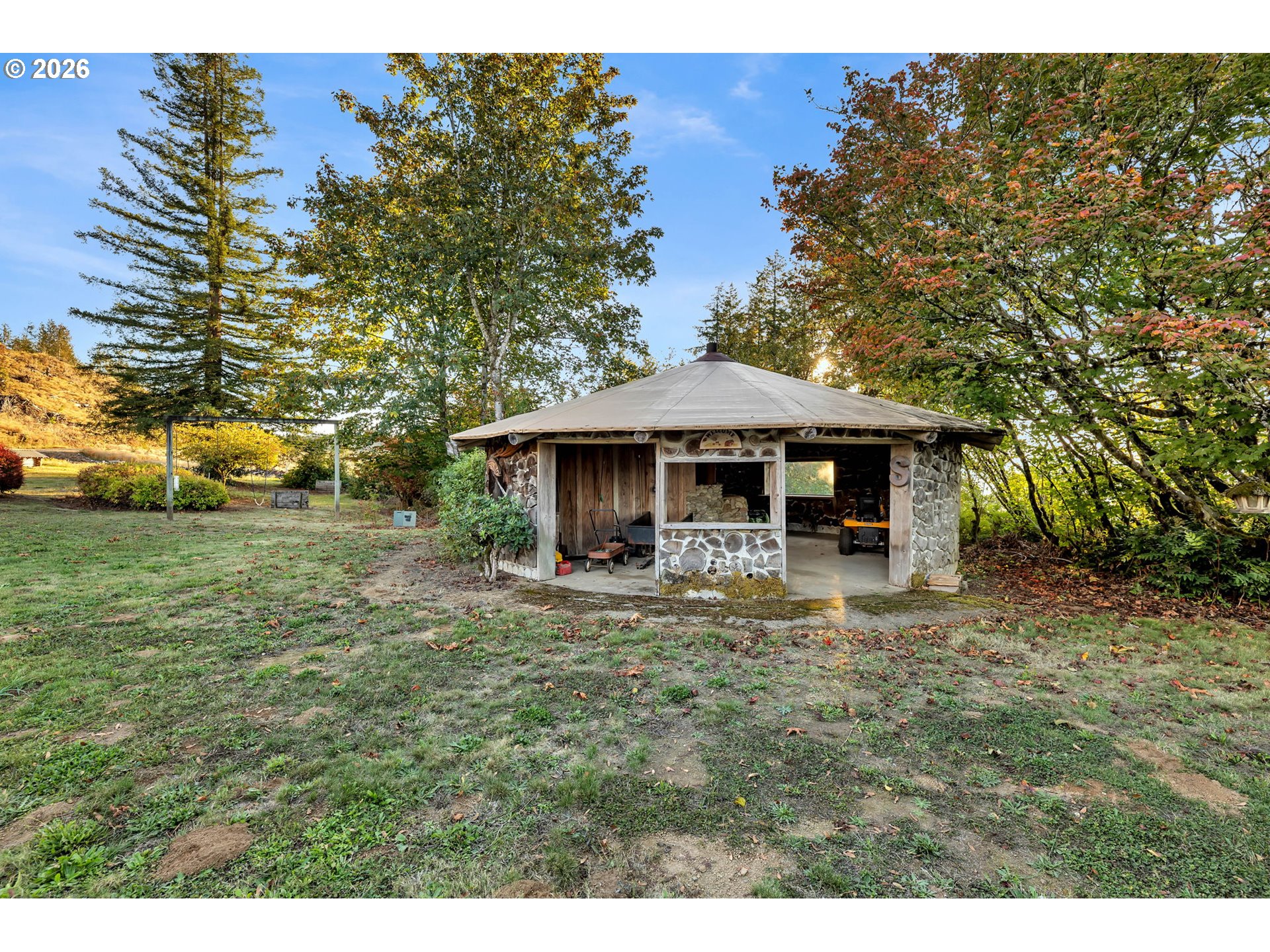 39904 Northeast Rotschy Road Yacolt, WA 98675 - Photo 28 of 48 a front view of a house with garden