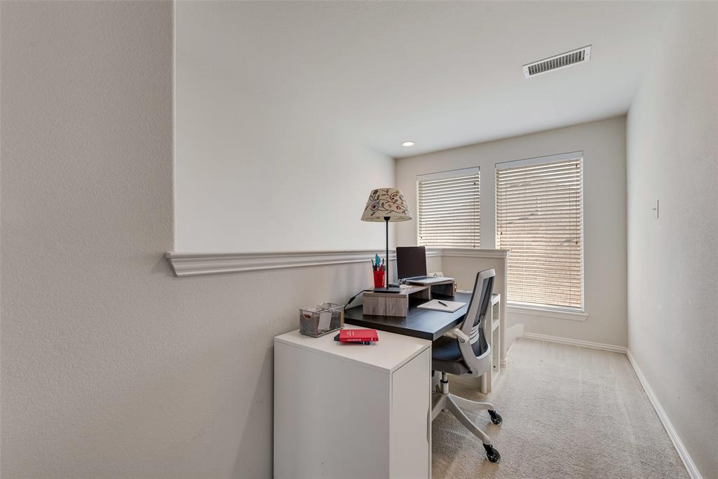 508 Elmgrove Trail Forney, TX 75126 - Photo 28 of 32 a view of a workspace with furniture and a window