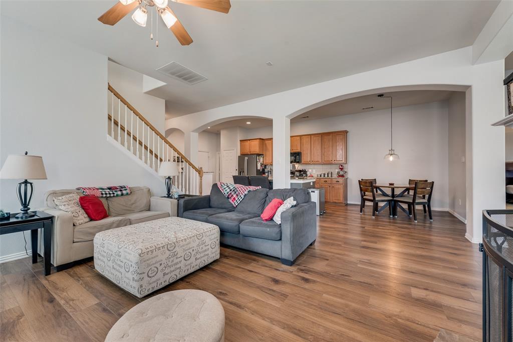 508 Elmgrove Trail Forney, TX 75126 - Photo 8 of 32 a living room with furniture and a wooden floor