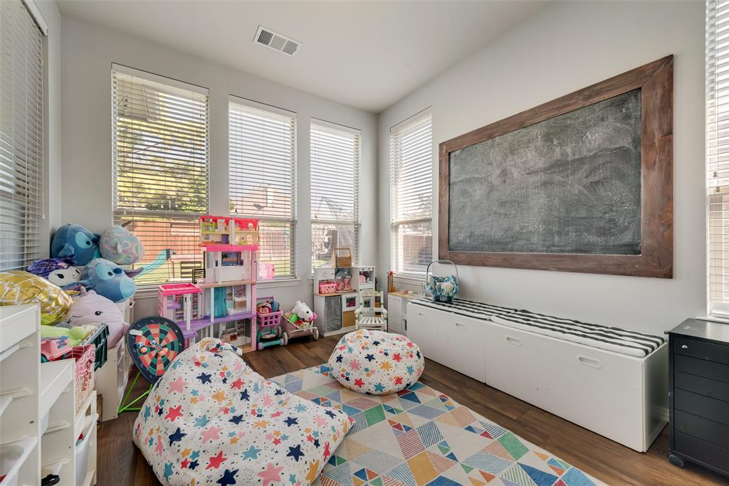 508 Elmgrove Trail Forney, TX 75126 - Photo 10 of 32 a bed room with furniture and a window