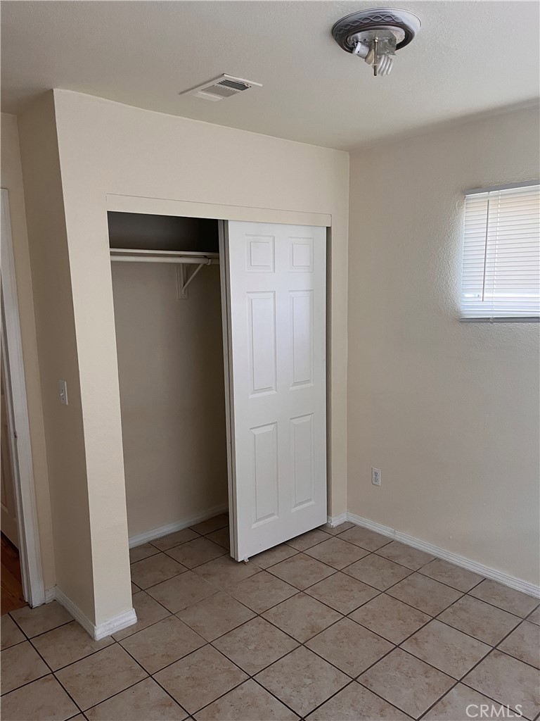 7207 Murray Lane, Unit A Yucca Valley, CA 92284 - Photo 6 of 14 Guest bedroom closet
